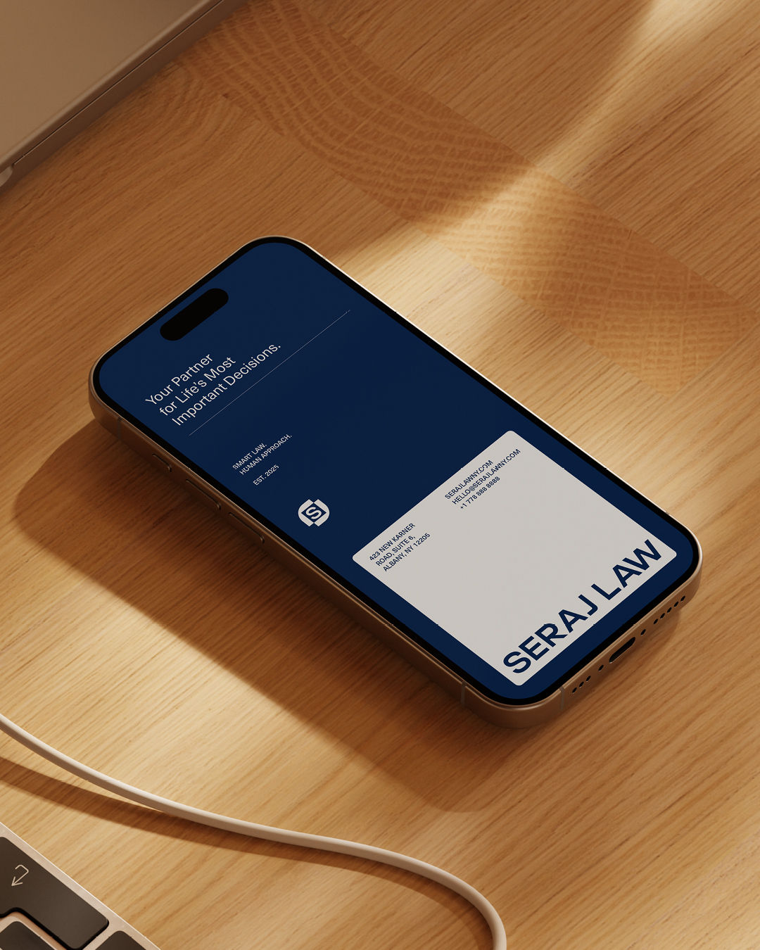 Seraj Law brand identity on iPhone
